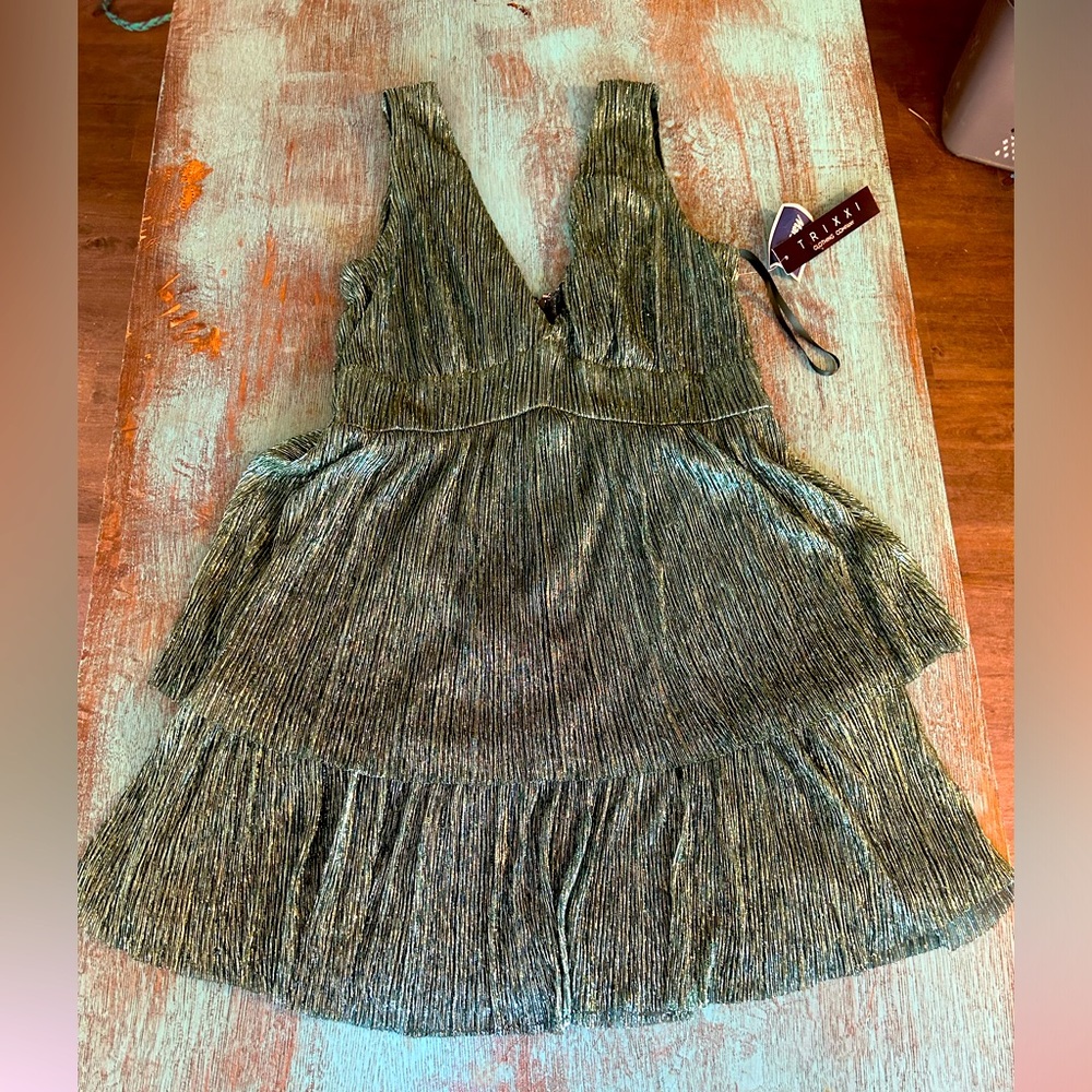 Green shimmery dress.